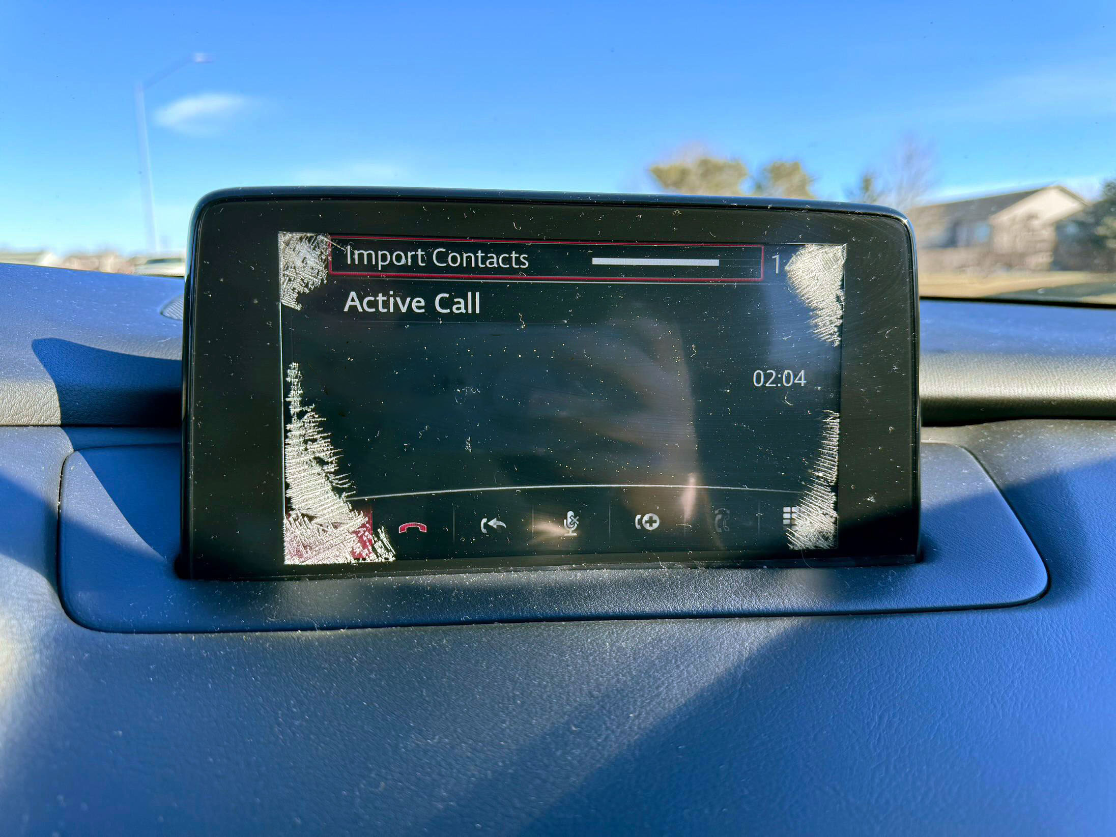 Car touchscreen with spider cracks from screen delamination
